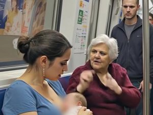 Metroda genç bir anne