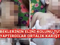 BEBEKLERİNİN ELİNİ KOLUNU TUTUP YAPTIRDILAR ORTALIK KARIŞTI